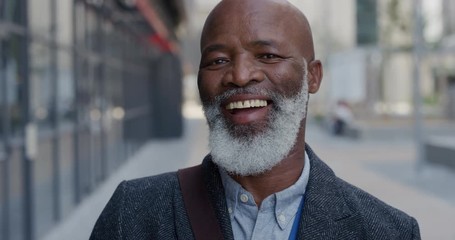 portrait happy senior african american businessman laughing in city enjoying professional urban lifestyle cheerful black man commuter slow motion - Powered by Adobe