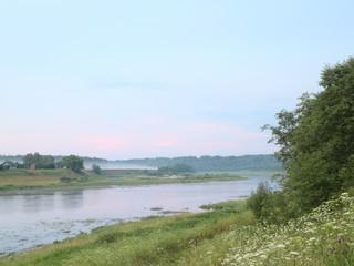 Fototapeta na wymiar Fishing on the river in the summer evening