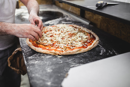 Close Up Shot Of Pizza Making Or Preparing Process