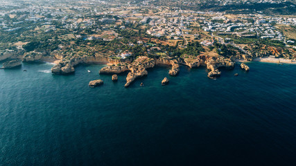Fototapeta premium Aerial view of the coast Algarve, Portugal. Concept for above beach of Portugal. Summer vacations in Portugal