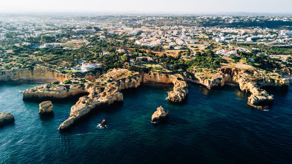Aerial view of the Algarve beaches. Concept for above beach of Portugal. Summer vacations in Portugal
