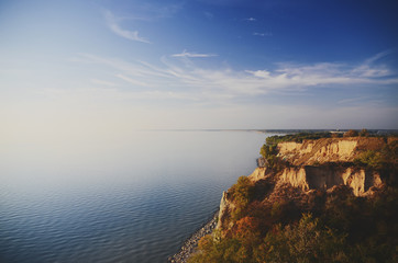 steep seashore. Calm on the sea.