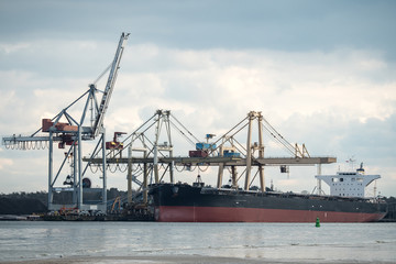 Fototapeta na wymiar unloaded big container ship in port