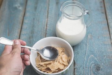 Cornflake cereals in a white bowl