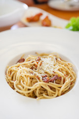 picy spaghetti bacon - spaghetti with bacon, chilli, garlic, tomato, black  olive on top Parmesan cheese and parsley.