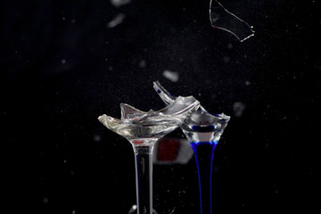 Broken glass in front of black background photographed under the name glass shards cocktail
