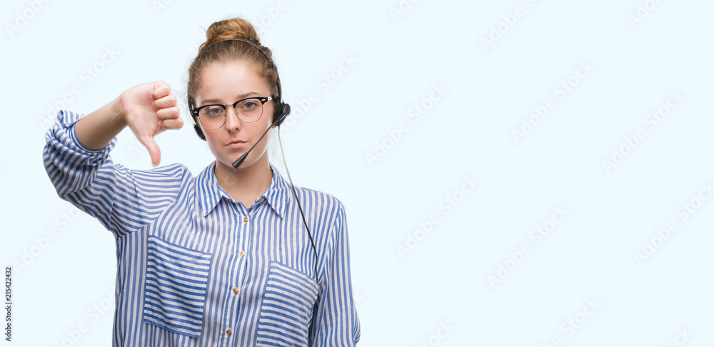 Sticker young blonde call center operator woman with angry face, negative sign showing dislike with thumbs d