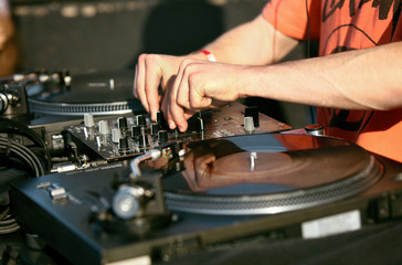 Naklejka premium DJ Mixing Music Track On Festival