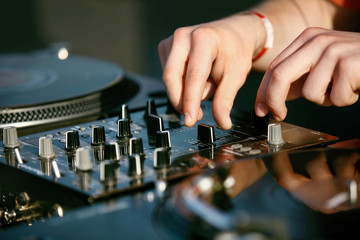 DJ Mixing Music Track On Festival