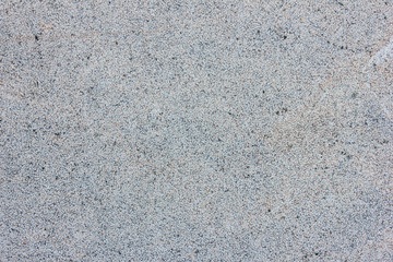 Granite Texture Background with Natural Stone Pattern. Pale Grey Granite Stone Surface Backdrop, Top View of Abstract Textured Background. Fragment of Natural Granite Wall, Floor or Interior Element.