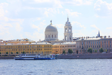 Fototapeta na wymiar St. Petersburg City Skyline with Historical Architecture Buildings in Russia. Outdoor Scenery of City Architecture with Colorful Classic European Houses and Tourist Cruise Boat on Neva River.