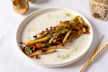 Fried potatoes with mushrooms