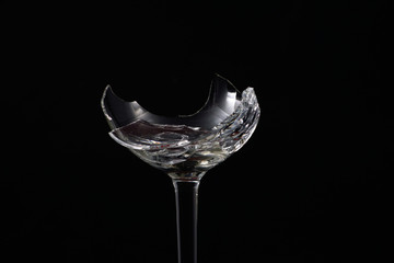 Broken glass in front of black background photographed under the name glass shards cocktail
