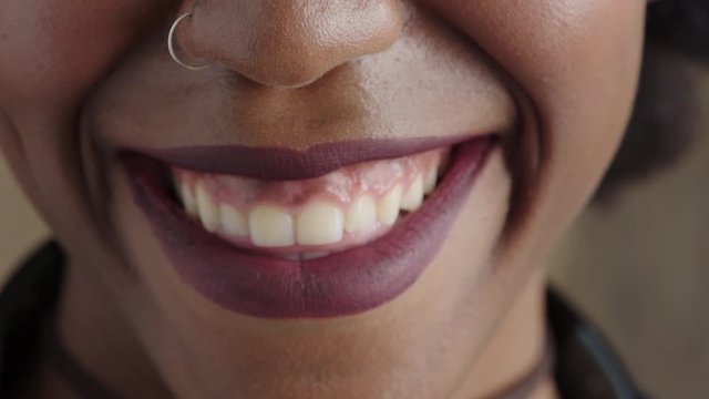 close up african american woman lips smiling happy mouth showing healthy teeth