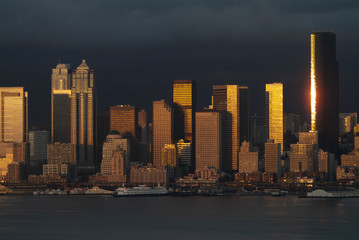 Dramatic Seattle, Washington Sunset Over Elliott Bay. Just after a rain squall the setting sun...