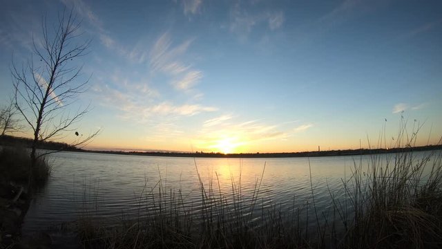 Time Lapse Of Sunset Over Lake With Dallas Skyline