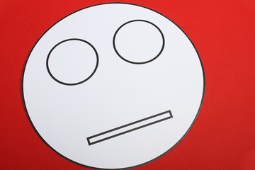 Wallpaper with a smiley face with a neutral emotion