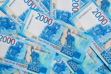 Fototapeta na wymiar Background of two thousandths Russian banknotes