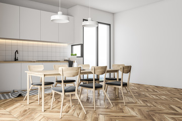 Naklejka na ściany i meble Gray chairs in a white kitchen interior