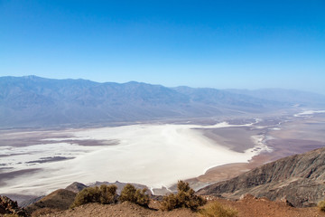 Fototapeta na wymiar View of Badwater Basin From Dante's View on a Hazy Day Following a Sandstorm in Death Valley