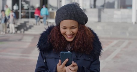 portrait beautiful young woman using smartphone video chatting enjoying talking on mobile phone smiling excited female student on college campus in city slow motion