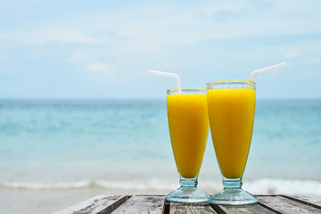glass with mango smoothies