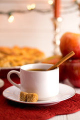 Hot Apple Cider with an Apple Pie and Cinnamon Stick