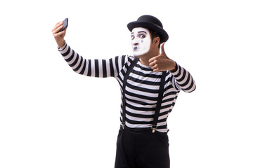 Mime with smartphone isolated on white background