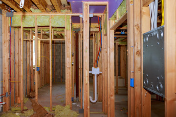 Fototapeta na wymiar New Construction Wood Home Framing Abstract.
