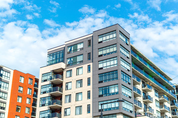 Fototapeta premium Modern condo buildings with huge windows in Montreal, Canada. 