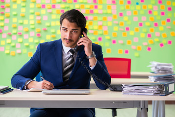Businessman with many conflicting priorities   