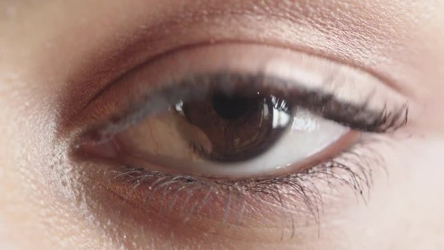 close up portrait woman eye blinking beautiful human iris detail natural beauty optical health