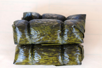 Sticky rice in the banana leaf.