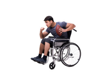 Obraz na płótnie Canvas Football player recovering from injury on wheelchair