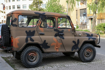 Obraz premium Off-road camouflaged car