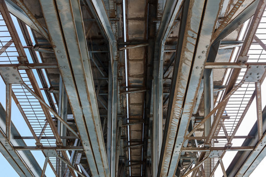 symmetrical metal structure of railroad bridge. closeup detail of framework 
