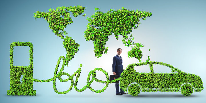 Businessman with car powered with biofuel
