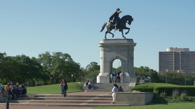 This video is about a slow motion view of tourist around the Sam Houston Statue in Houston, Texas. This video was filmed in 4k for best image quality.
