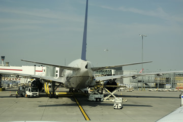 Close-up of large passenger aircraft on runway in airport. 