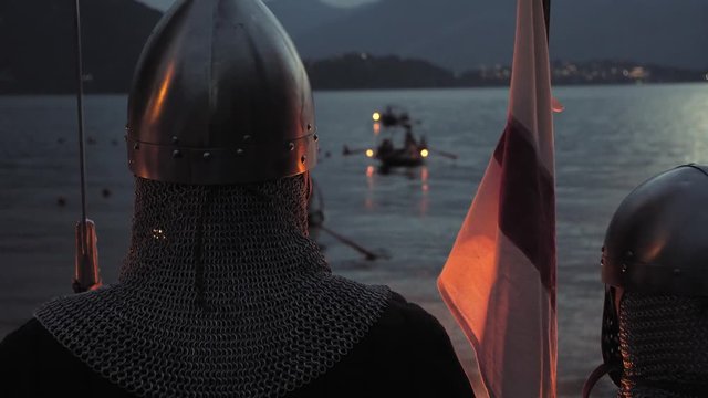 Historical Reconstruction Of Medieval Culture in lierna, whit king queen a castle on the river of the lake