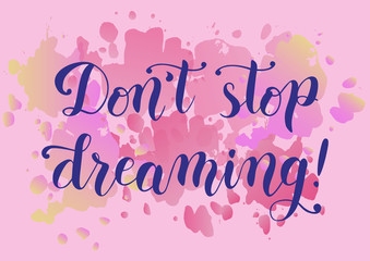 Modern calligraphy of motivational phrase Don't stop dreaming in blue on pink watercolor background for poster, postcard, decoration, print, cover of notebook, packaging, greeting card, bookmark