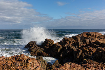 Wave spray at West Point State reserve beach, Tasmania, Australia