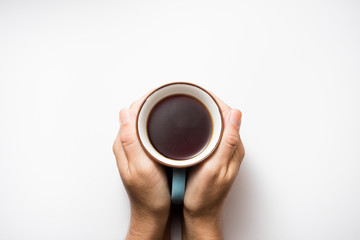 Tea in the palm on white background