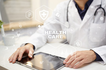 Medicine and healthcare concept. Medical doctor working with modern pc. Electronic health record. EHR, EMR.