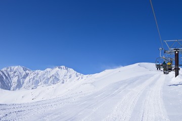 Panoramic ski at hakuba happo in Nagano Japan with blue and chairlift