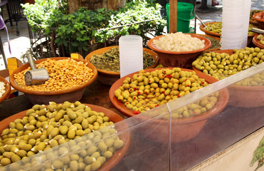 Different marinated olives on a street market in Soller, Majorca, Spain.