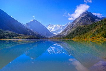 Naklejka na ściany i meble sacred sacred Belukha mountain reflected in the lake Akkem, Altai mountains, Russia