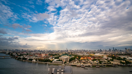 Naklejka premium Bangkok cityscape along Chaopraya river from high view