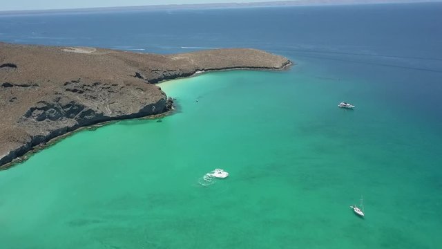 This is a video clip i shoot in Baja california Sur, Mexico in Balandra Beach this year with my Mavic which you can look the cristal water, rocks, etc.