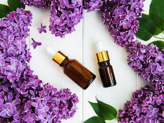 Essential oil with lilac flowers